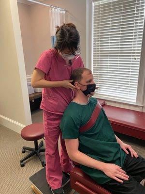 Dr. Son performing a cervical adjustment using the Gonstead Technique