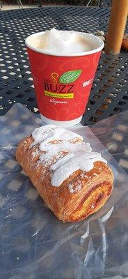 Breakfast on the patio: almond croissant and small caramel latte.