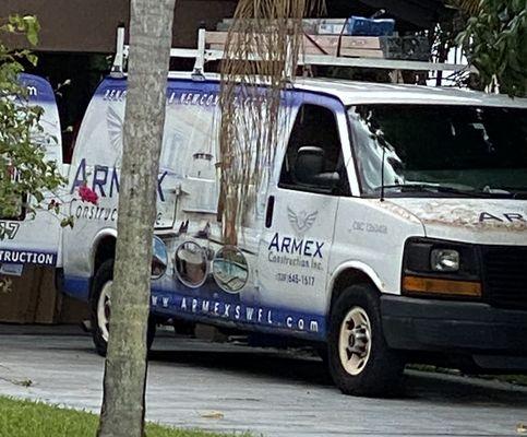 Armex company van at the site.