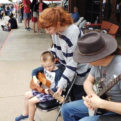 Hosting a musical petting zoo at the Sunday Farmer's Market in College View