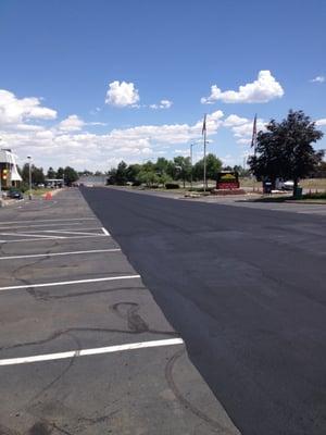 Another quality job ( liquid road applied to a drive lane at an apartment complex