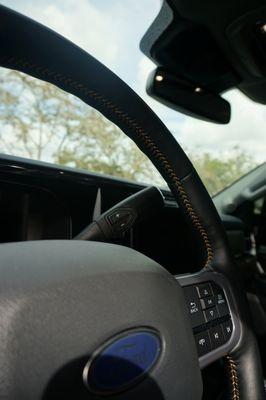 Custom stitching on steering wheel