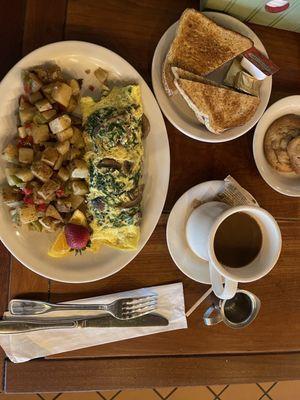 Homemade Potato Chips and Omelette with mushrooms and spinach