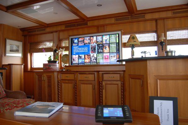 Pop Up Cabinet with 55" TV on a Boat