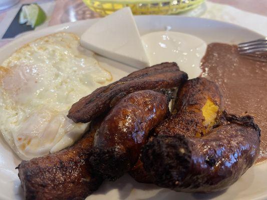 This is the two eggs w/chorizo and plantains w/crème and bean sauce?  Don't know all the descriptions of the proteins.