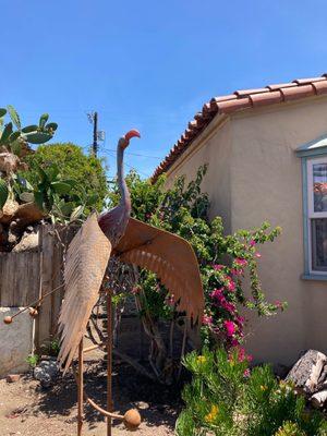 Metal flamingo sculpture