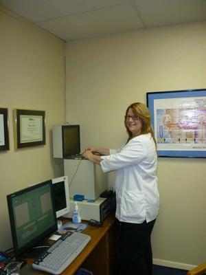 Pamela Currier - testing a hearing aid!