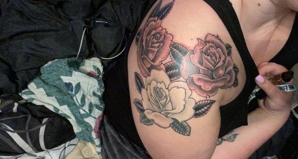 Added on roses to a previous tattoo