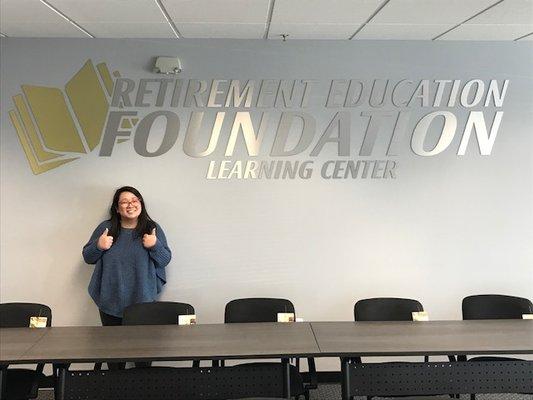 Education center sign with 12 foot wide brushed aluminum letters