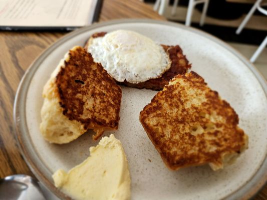 Lunch @Jack's Restaurant; 12/22/2023. Hubby David ordered one of their "Breakfast Combos", Cornbeef Hash, 1 Egg & Grilled Biscuit.