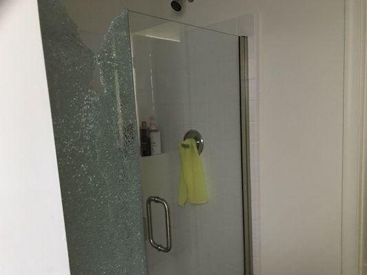 Shattered glass shower door.