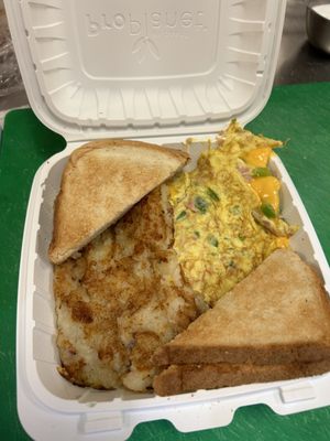 Western omelette with home fries and toast