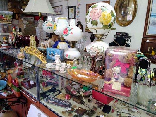 Variety of Antiques and Collectibles including jewelry, tools, glassware, tools and toys.