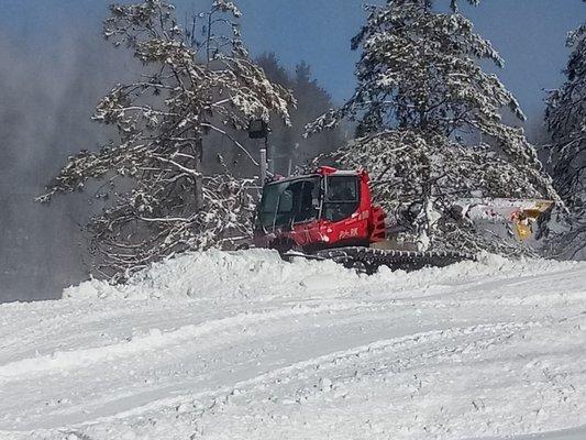 Pushin piles of freshly made snow