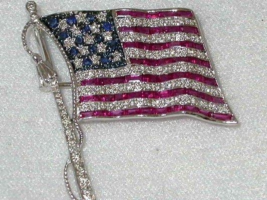 Patriotic talent with rubies, sapphires and diamonds.