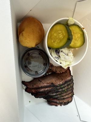 Brisket Plate, Coleslaw, pickles, and corn bread.