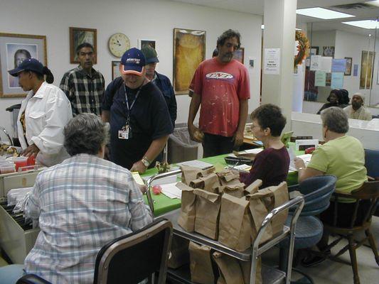 Serving bag lunches at Potter's House