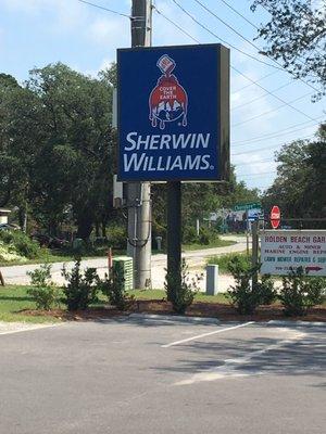 Sign by Holden Beach Road. Plenty of parking in the lot for customers and contractors