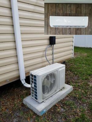 Mini-Split AC System
 Top right corner picture is the head (installed inside) Larger picture is the condenser (installed outside)