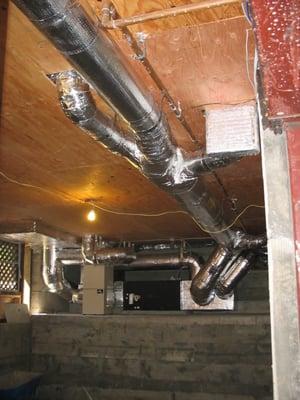 Exposed ductwork in a basement