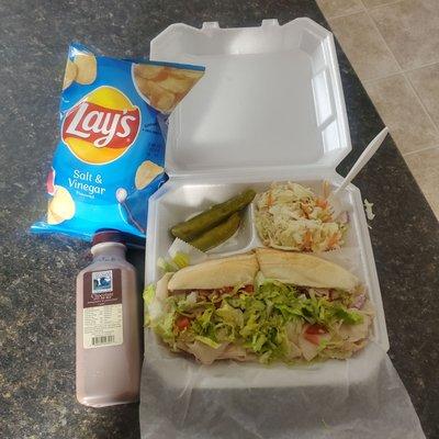 Turkey Salami Sub, Coleslaw an some pickle. Good Ole fashioned chocolate milk an my fav Salt an Vinegar chips