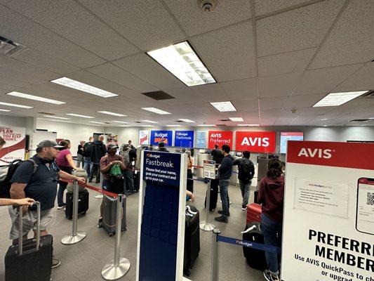 1am at Avis Dulles airport. 32 people in line, two workers. Second time I've been here for a late flight and it's been this same chaos.