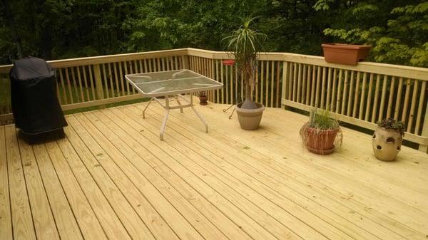 Deck Repair Completed. New floor deck boards, new railing and deck support enhanced. Treated Decking Lumber used...