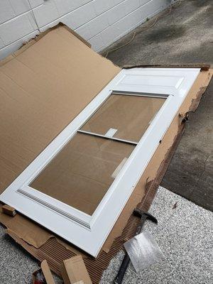 Getting a new screen door put in. They did not have the dark door, so I got the white door.