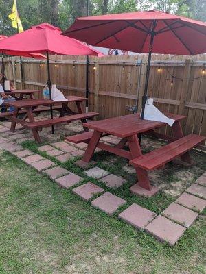 seating area, the umbrellas tend to fall down