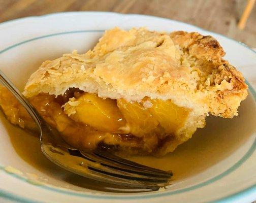 A slice of the *perfect* peach pie.