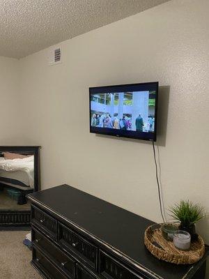 I only have a picture of the small tv mounted , but they did an excellent job!