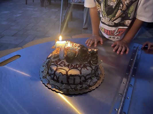 Ice cream birthday cake for my boy's 7th birthday, it's a chocolate cake with hazelnut ice cream.