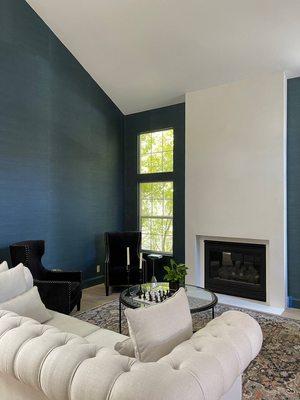 Custom plaster fireplace and wallpapers