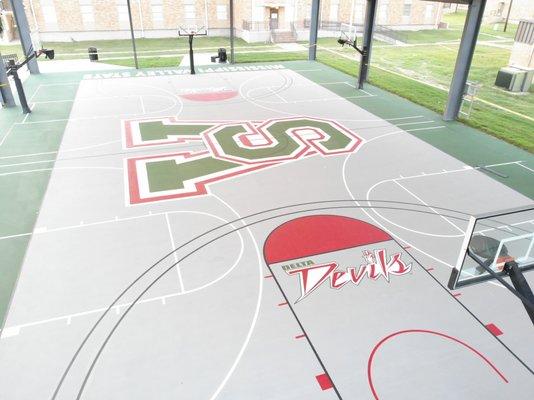 Commercial concrete coating on outdoor basketball court for Mississippi Valley State