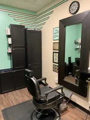 My salon chair and mirror in my salon.