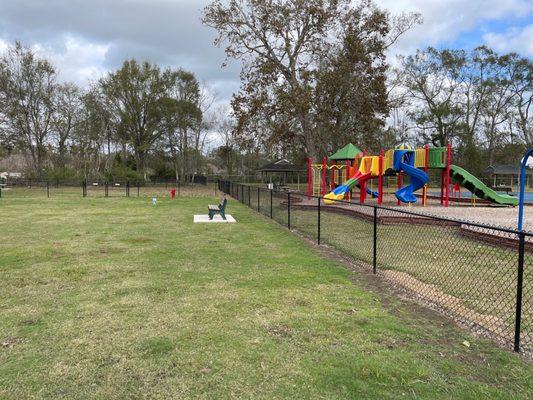 The kids playground is right next to the dog park