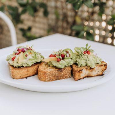 joe's avo toast: noble sourdough bread, smashed avocado, seasonal fruits/veggies