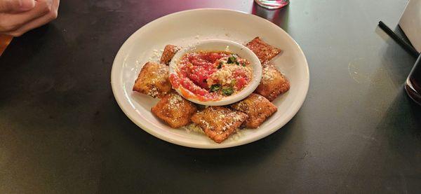 Toasted ravioli...serviceable, but overpriced. Also the only plate we would see on our table.