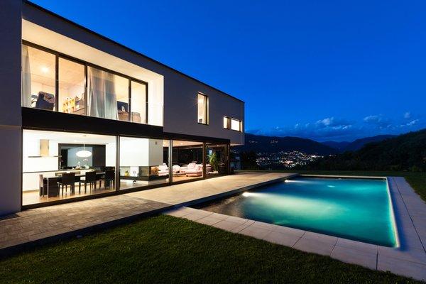 Modern home with a pool and a view