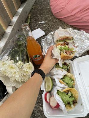 Carnitas tacos and chicken torta with everything.