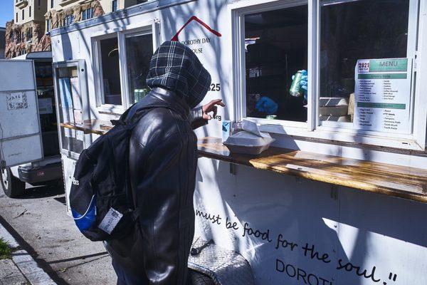 Serving from our Community Outreach Trailer. Food, Socks, masks, clean water and much more