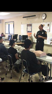 LAFD AT The Venice Skills Center Health Fair holding a CPR class.