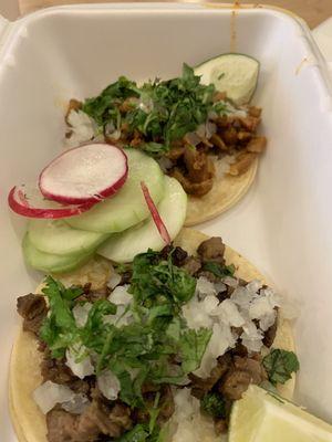 Taco al pastor and flank steak taco