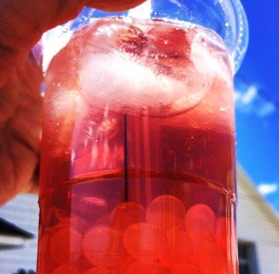 Bubble tea! Hibiscus tea with pomegranate syrup bubble things