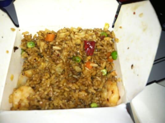 Disgusting shrimp fried rice saturated in soy sauce. My family could not even eat this!