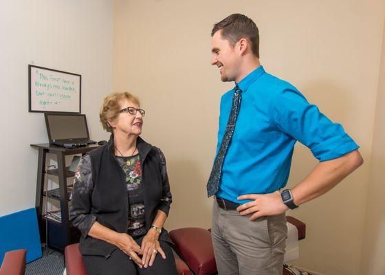 Dr. Brad working with a patient