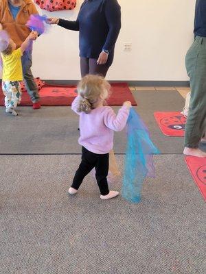 Dancing with scarfs.