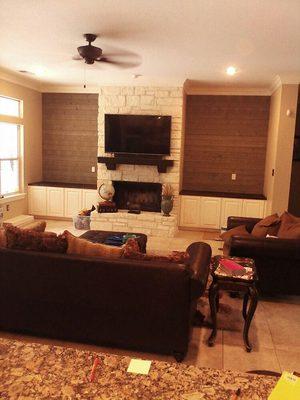 Removed bookshelf upper cabinets, new hardwood tops and reclaimed wood siding