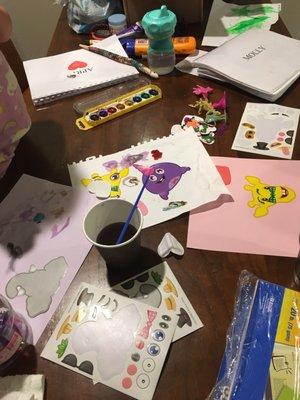 Indoor family fun activities like watercolor painting, children's arts & crafts.