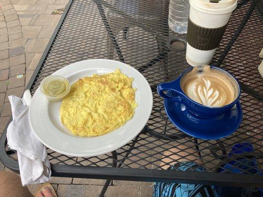 Wonderful two eggs scrambled w green chili sauce fr Breakfast Urbano!! Very proteinaceous!! & delicious! (+ Mocha Brêve from Viator)